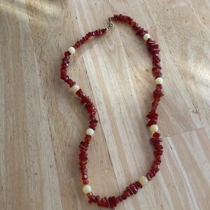 Vintage stone and beaded necklace about 20 inches. Red stones and yellow beads.